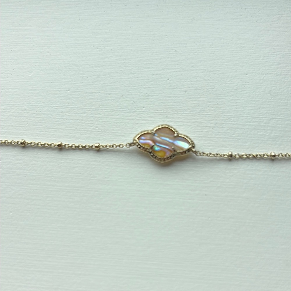 Elegant Gold and Iridescent Kendra Scott necklace